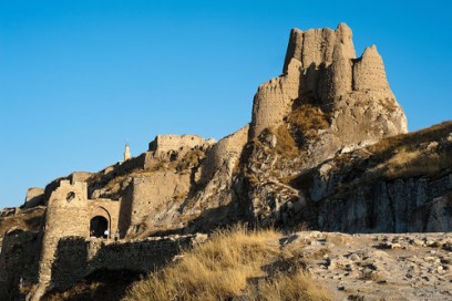 The Ruins of Van Fortress. The Fortress of Van is a massive stone fortification built by the ancient kingdom of Urartu during the 9th to 7th centuries BC